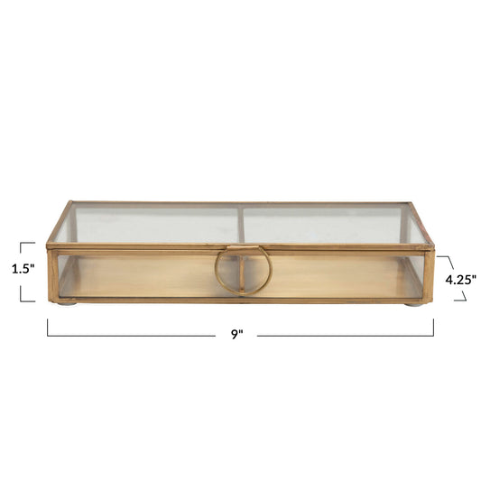 Brass and glass display box with center handle and a rectangular shape.